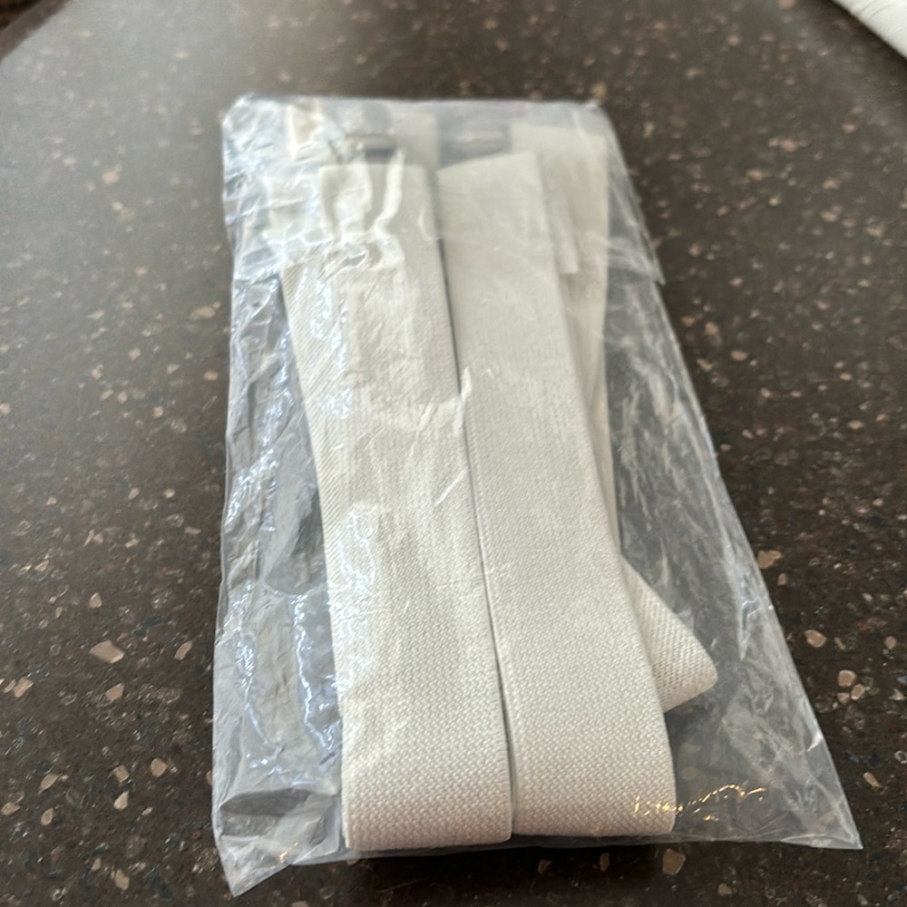 2 PAIR OF BRAND NEW IVORY SUSPENDERS! One in bag one without!